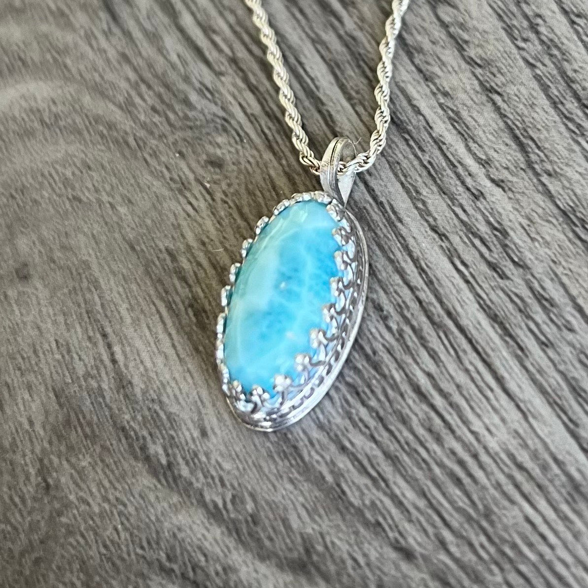 Larimar necklace set in sterling silver with rope chain.